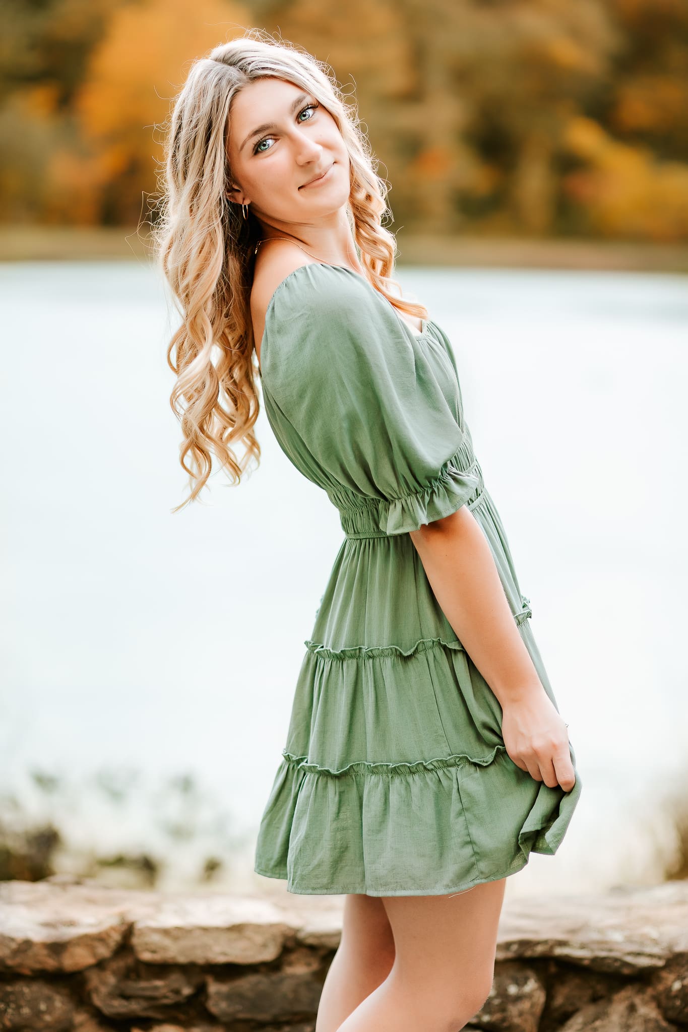 Senior girl who chose a dress for what to wear during her senior photos in New Hampshire.