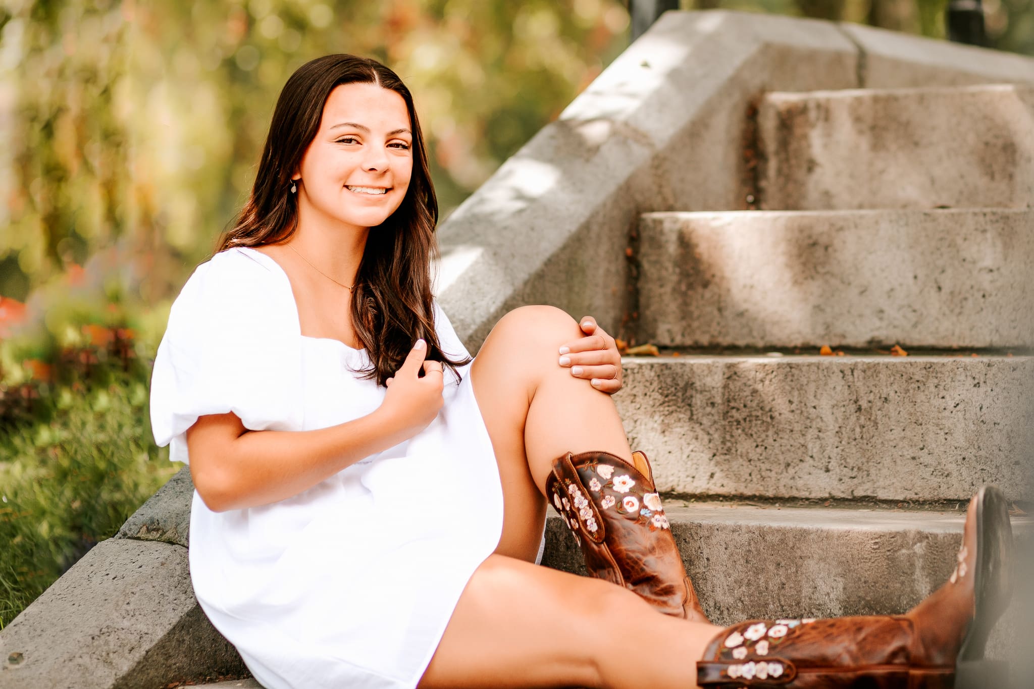Jess chose to wear her favorite Texas cowboy boots as a way to personalize her senior photo session in Boston, Massachusetts.