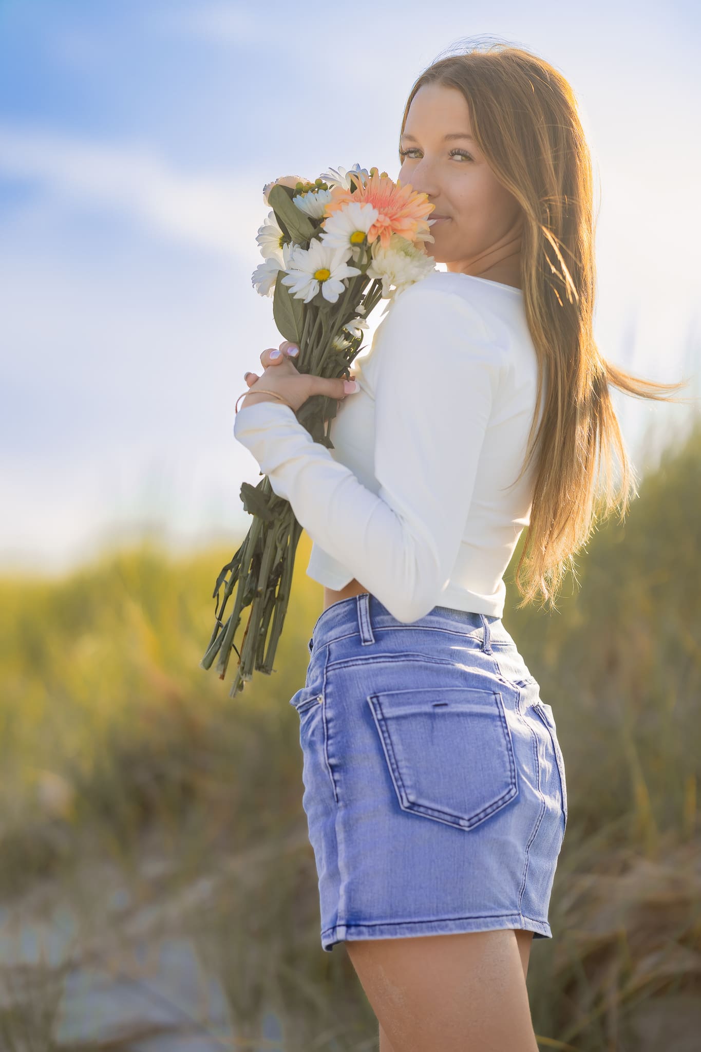 Summer season is the perfect backdrop for this senior photo session at the beach in New Hampshire.