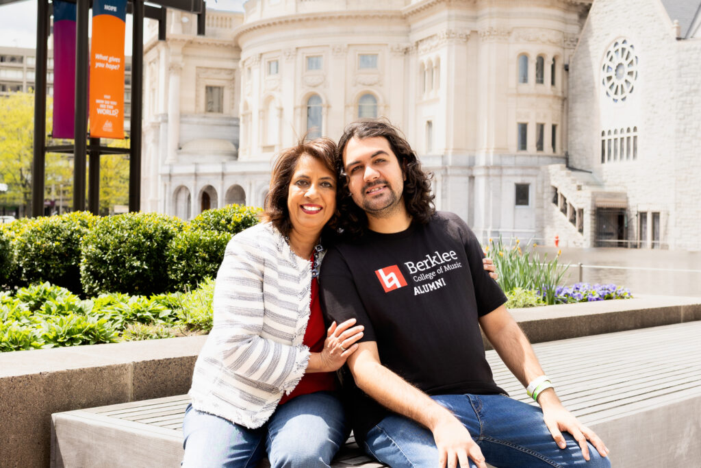 Mom and her son together during his college senior photo session in Boston