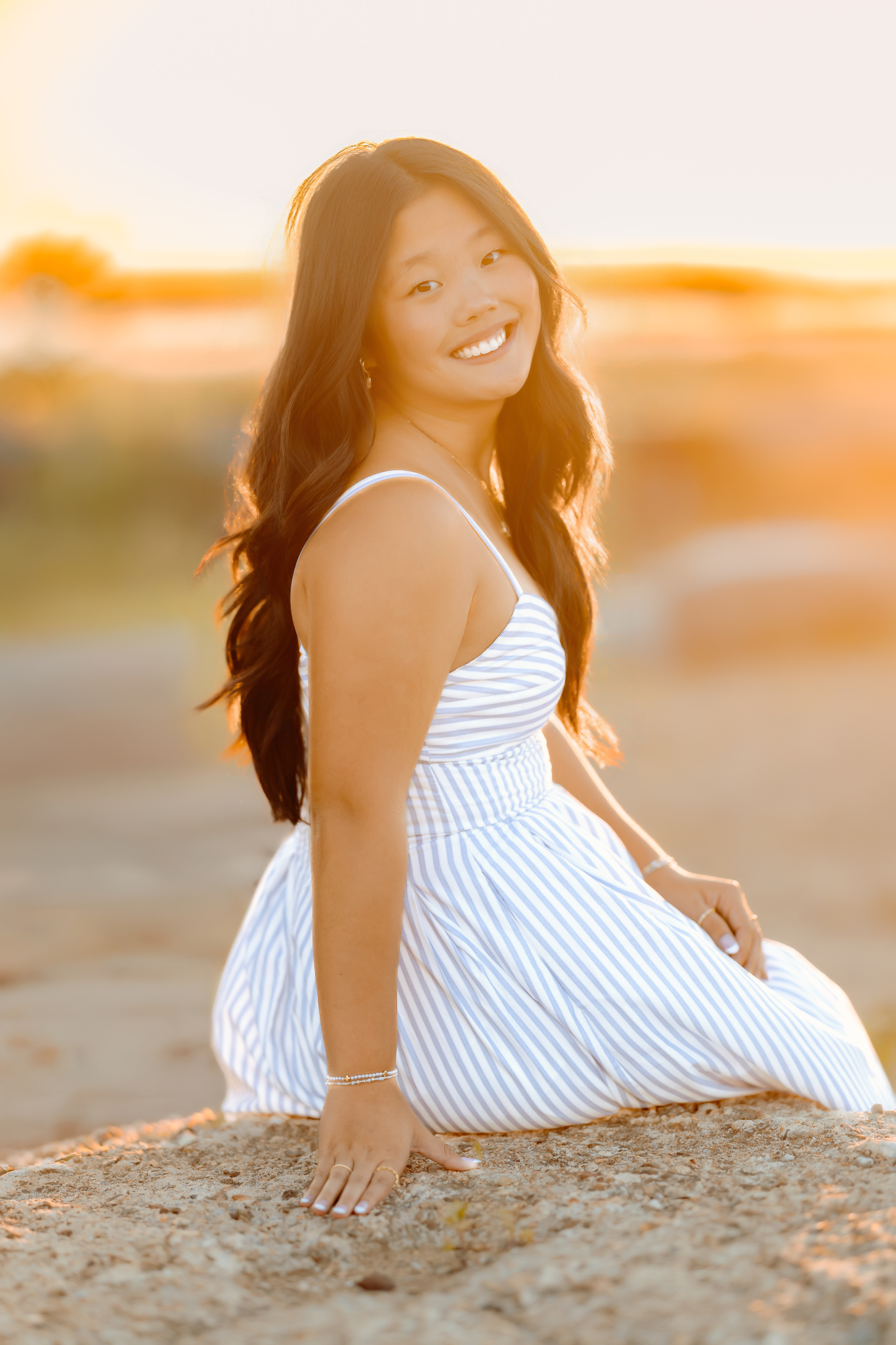 Golden hour photo of a high school senior girl posing at Plum Island beach, Newburyport, MA